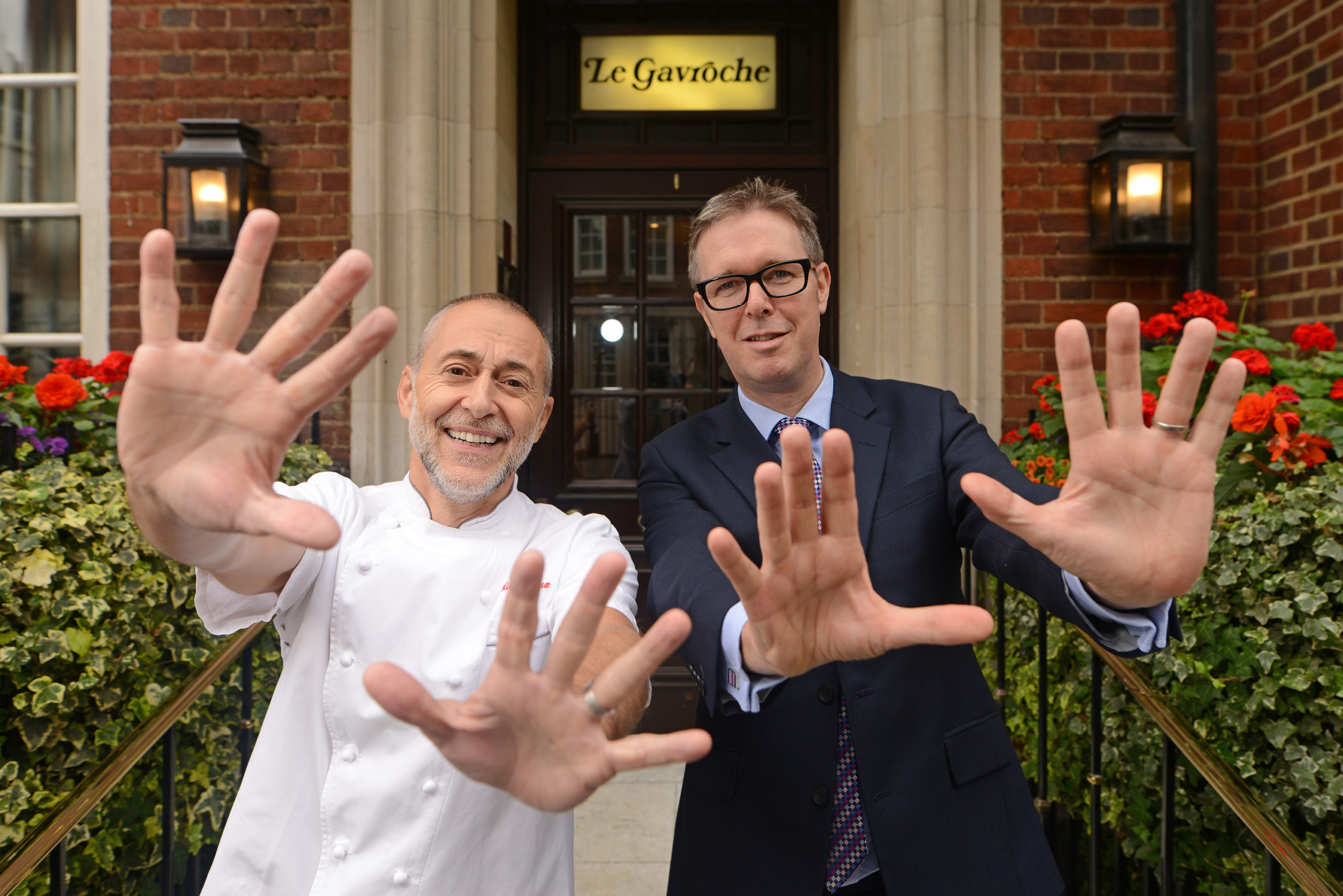Alex Cheatle & Michel Roux Jr outside Le Gavroche, a restaurant frequented by our members, many of whom are corporate members through their banks